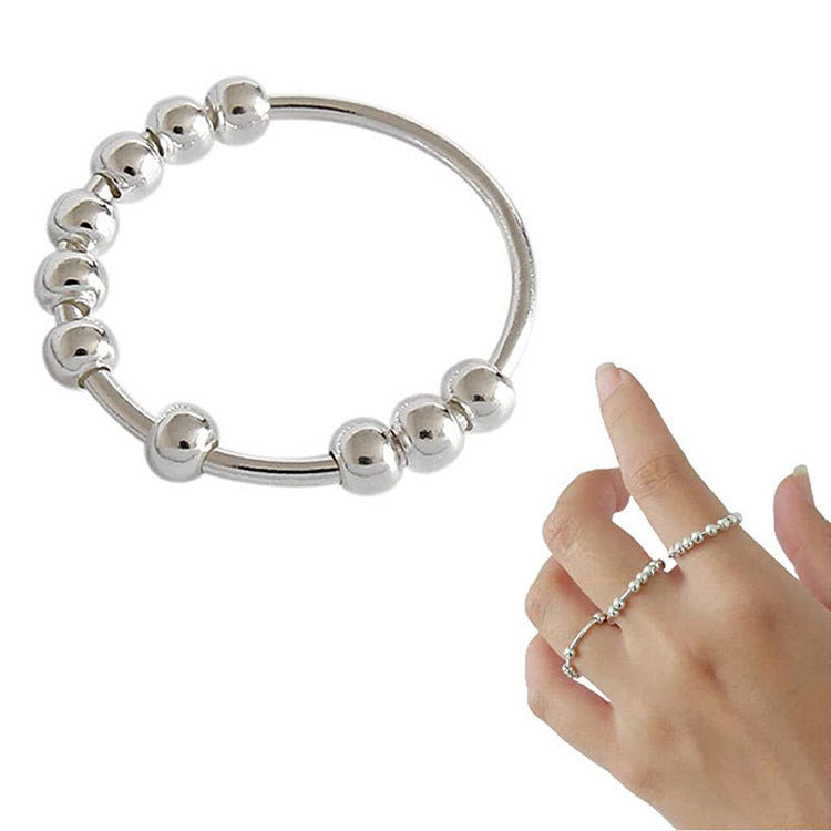 Ring roterande pärlor Anti-stress