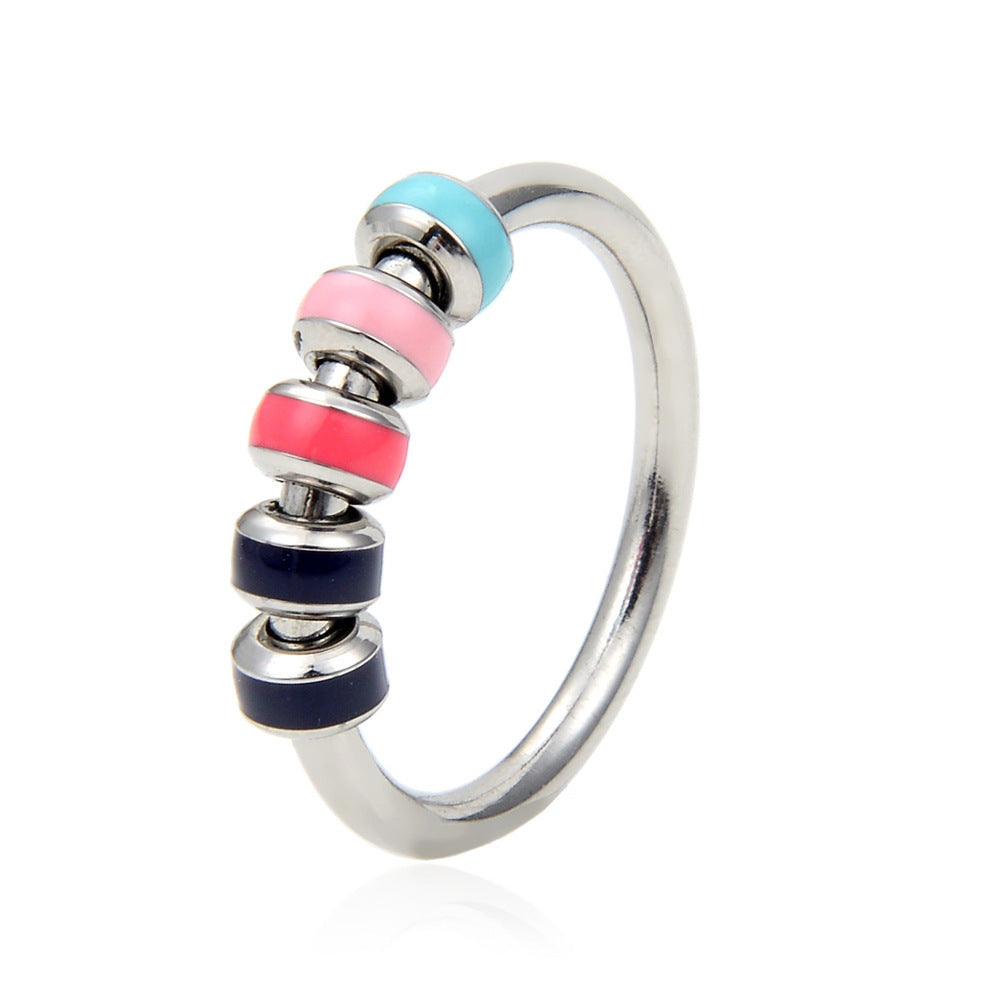Ring roterande pärlor i olika färger Anti-stress