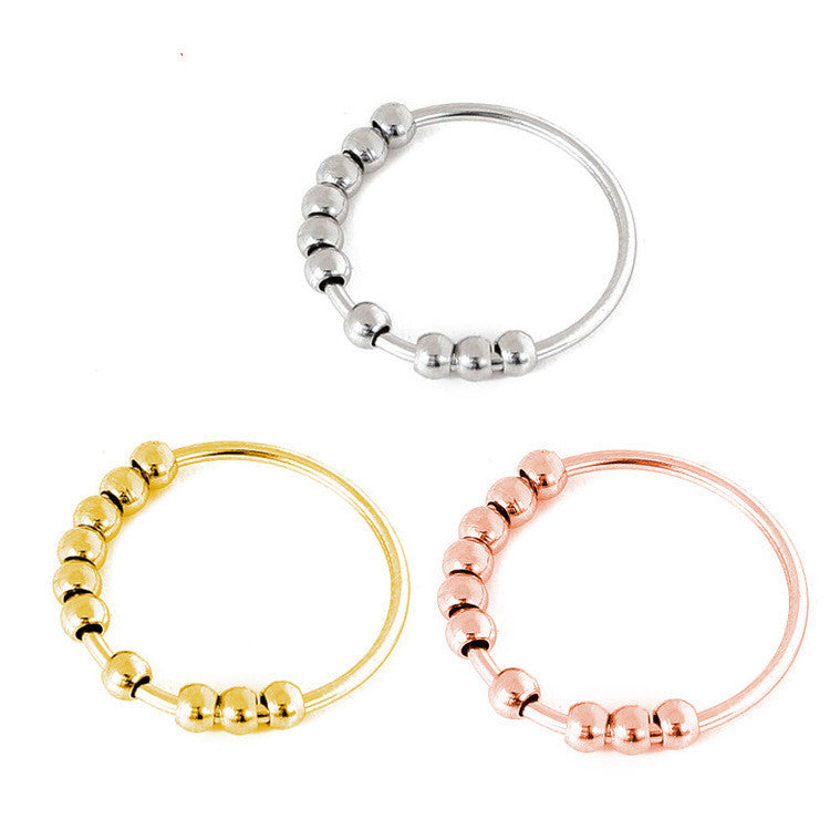 Ring roterande pärlor Anti-stress