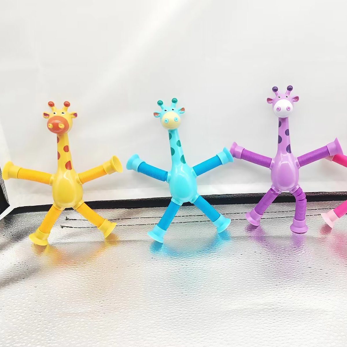 Giraff med poptuber - Anti-stressleksak